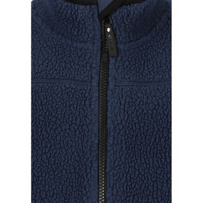 Detaljebillede af den bløde struktur på en ZigZag Root børnefleece i navy